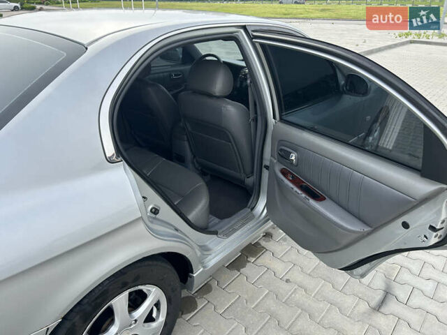 Сірий Кіа Маджентіс, об'ємом двигуна 2 л та пробігом 265 тис. км за 4700 $, фото 10 на Automoto.ua