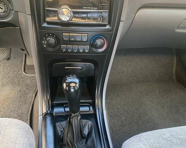 Серый Киа Маджентис, объемом двигателя 2 л и пробегом 334 тыс. км за 3200 $, фото 6 на Automoto.ua