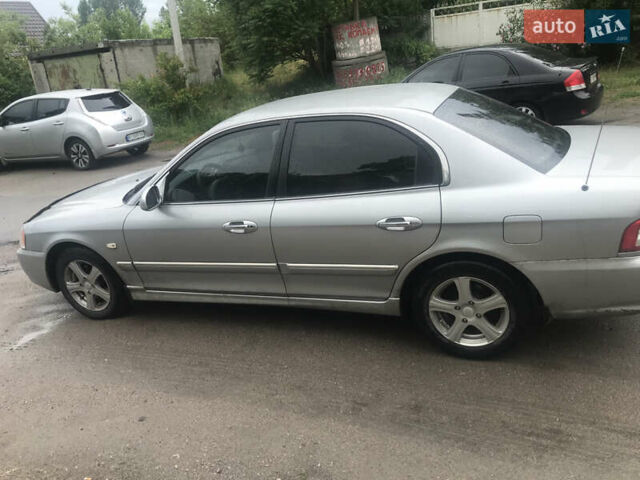 Сірий Кіа Маджентіс, об'ємом двигуна 2 л та пробігом 290 тис. км за 1500 $, фото 5 на Automoto.ua