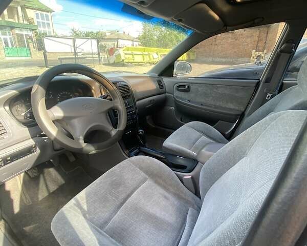 Серый Киа Маджентис, объемом двигателя 2 л и пробегом 334 тыс. км за 3200 $, фото 4 на Automoto.ua