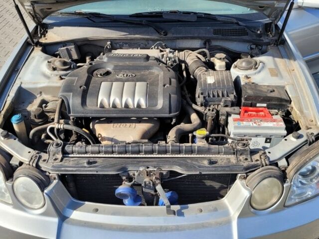 Сірий Кіа Маджентіс, об'ємом двигуна 2 л та пробігом 321 тис. км за 3550 $, фото 4 на Automoto.ua