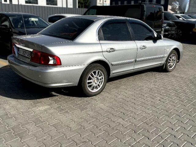 Сірий Кіа Маджентіс, об'ємом двигуна 2 л та пробігом 321 тис. км за 3550 $, фото 2 на Automoto.ua