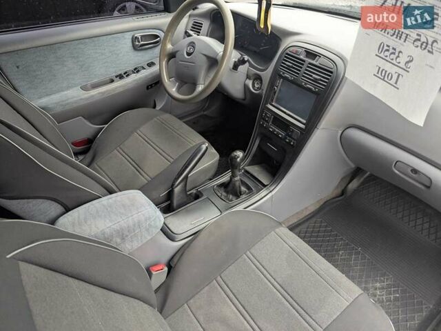 Серый Киа Маджентис, объемом двигателя 2 л и пробегом 264 тыс. км за 2990 $, фото 25 на Automoto.ua