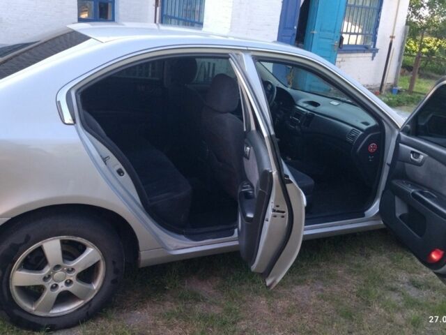 Серый Киа Маджентис, объемом двигателя 2 л и пробегом 200 тыс. км за 4850 $, фото 4 на Automoto.ua