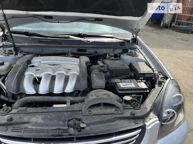 Сірий Кіа Маджентіс, об'ємом двигуна 2 л та пробігом 213 тис. км за 6700 $, фото 58 на Automoto.ua