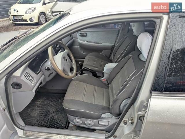 Серый Киа Маджентис, объемом двигателя 2 л и пробегом 264 тыс. км за 2990 $, фото 17 на Automoto.ua