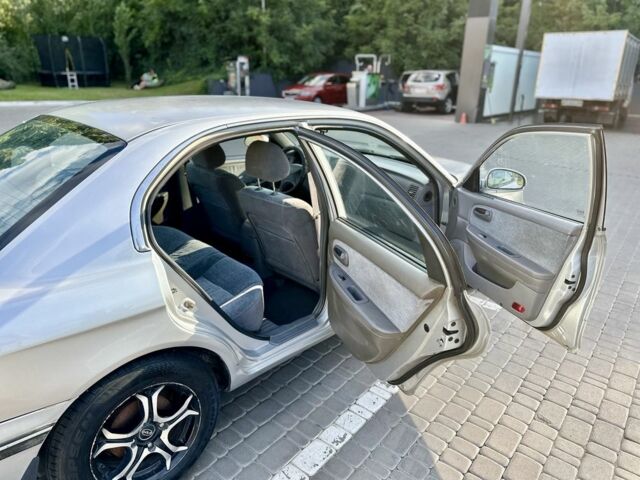 Серый Киа Маджентис, объемом двигателя 2 л и пробегом 280 тыс. км за 3500 $, фото 5 на Automoto.ua