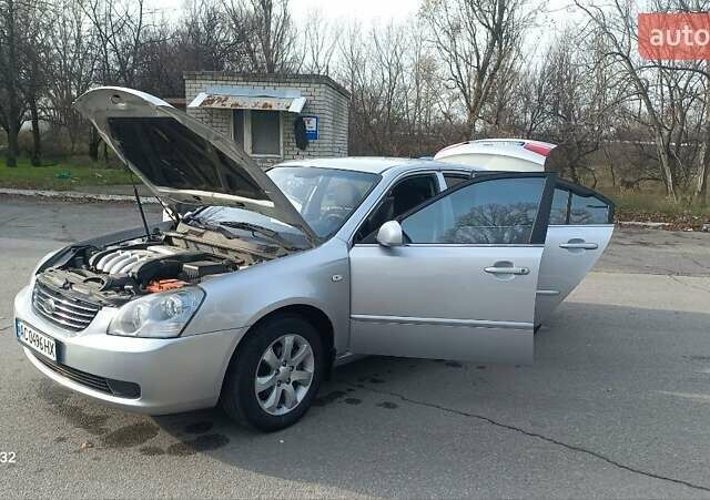 Сірий Кіа Маджентіс, об'ємом двигуна 2 л та пробігом 251 тис. км за 4700 $, фото 2 на Automoto.ua