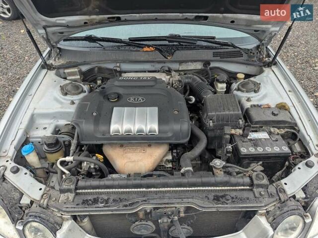 Серый Киа Маджентис, объемом двигателя 2 л и пробегом 264 тыс. км за 2990 $, фото 29 на Automoto.ua