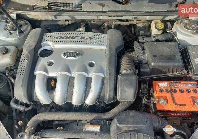 Сірий Кіа Маджентіс, об'ємом двигуна 2 л та пробігом 251 тис. км за 4700 $, фото 6 на Automoto.ua