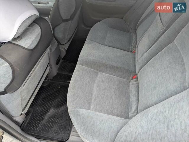 Сірий Кіа Маджентіс, об'ємом двигуна 2 л та пробігом 264 тис. км за 2850 $, фото 20 на Automoto.ua