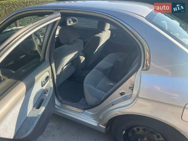 Сірий Кіа Маджентіс, об'ємом двигуна 2 л та пробігом 230 тис. км за 3300 $, фото 6 на Automoto.ua