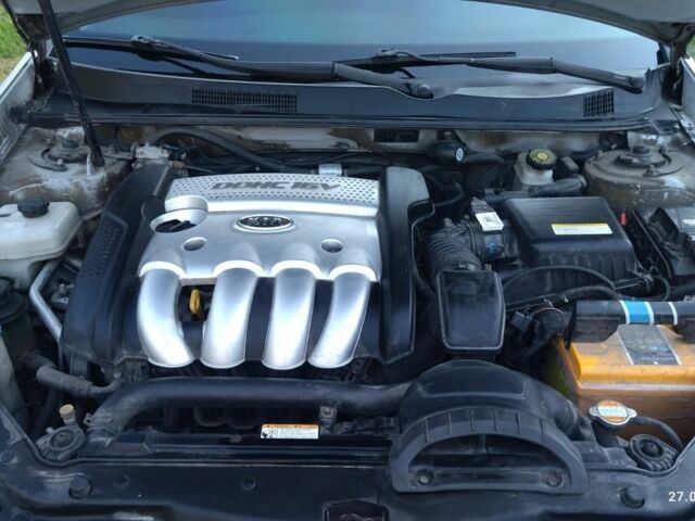 Серый Киа Маджентис, объемом двигателя 2 л и пробегом 200 тыс. км за 4850 $, фото 3 на Automoto.ua