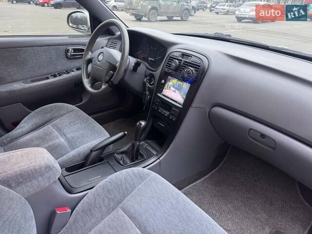 Сірий Кіа Маджентіс, об'ємом двигуна 2 л та пробігом 179 тис. км за 4350 $, фото 8 на Automoto.ua