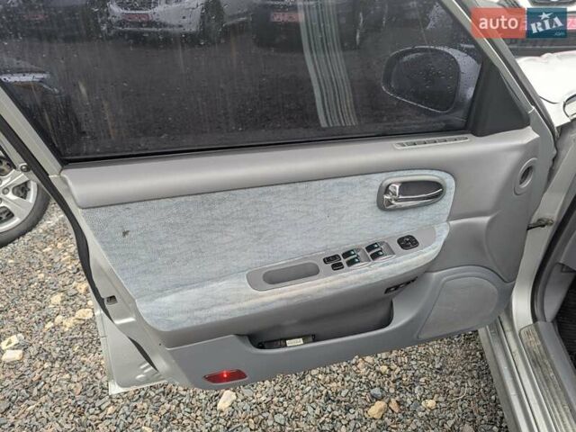 Серый Киа Маджентис, объемом двигателя 2 л и пробегом 264 тыс. км за 2990 $, фото 16 на Automoto.ua