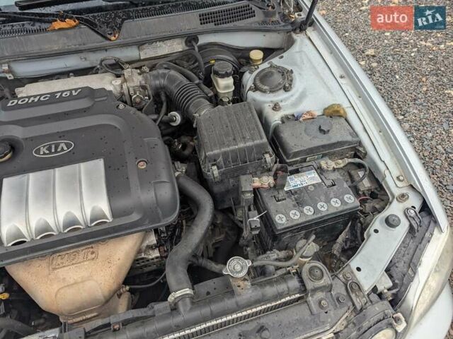 Сірий Кіа Маджентіс, об'ємом двигуна 2 л та пробігом 264 тис. км за 2850 $, фото 32 на Automoto.ua