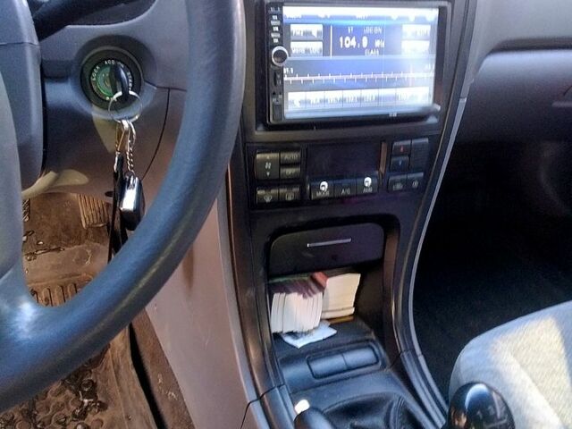 Сірий Кіа Маджентіс, об'ємом двигуна 2 л та пробігом 260 тис. км за 4100 $, фото 5 на Automoto.ua