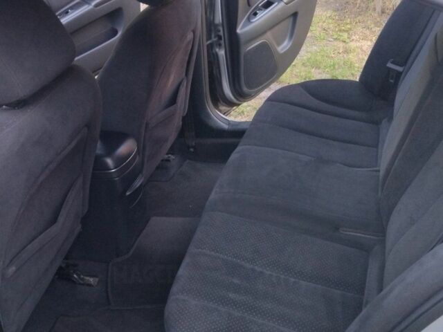 Серый Киа Маджентис, объемом двигателя 2 л и пробегом 200 тыс. км за 4850 $, фото 1 на Automoto.ua