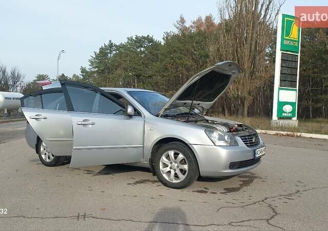 Сірий Кіа Маджентіс, об'ємом двигуна 2 л та пробігом 251 тис. км за 4700 $, фото 18 на Automoto.ua