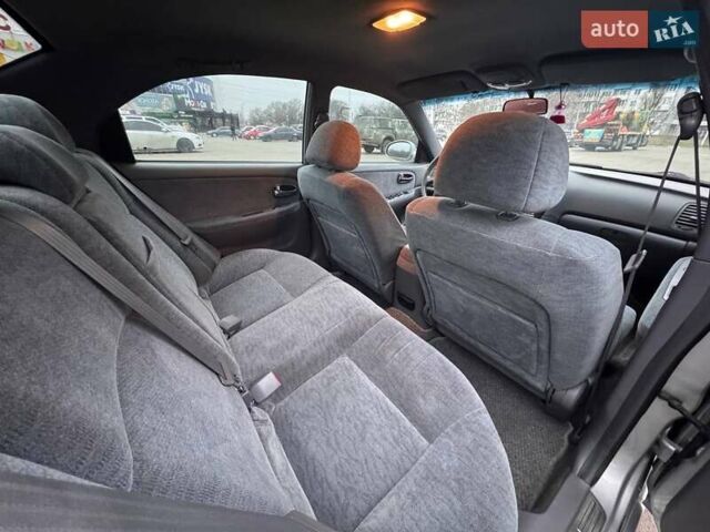 Сірий Кіа Маджентіс, об'ємом двигуна 2 л та пробігом 179 тис. км за 4350 $, фото 11 на Automoto.ua