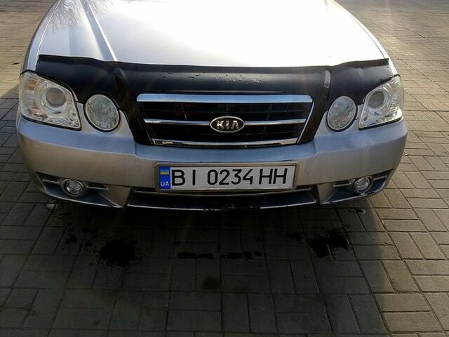 Сірий Кіа Маджентіс, об'ємом двигуна 2 л та пробігом 260 тис. км за 4100 $, фото 8 на Automoto.ua