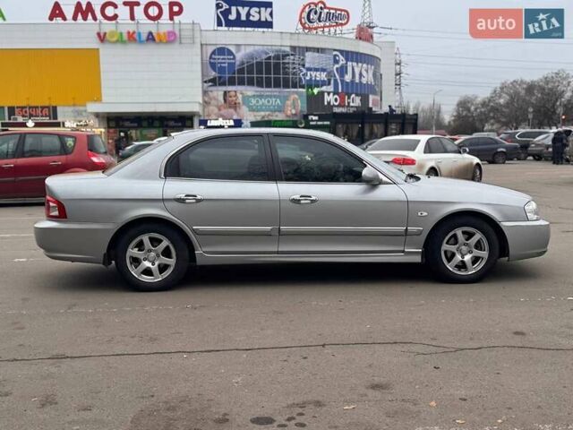 Сірий Кіа Маджентіс, об'ємом двигуна 2 л та пробігом 179 тис. км за 4350 $, фото 4 на Automoto.ua