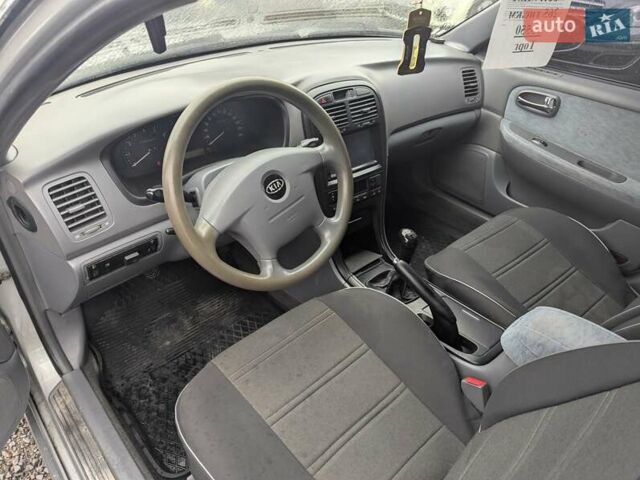 Серый Киа Маджентис, объемом двигателя 2 л и пробегом 264 тыс. км за 2990 $, фото 15 на Automoto.ua