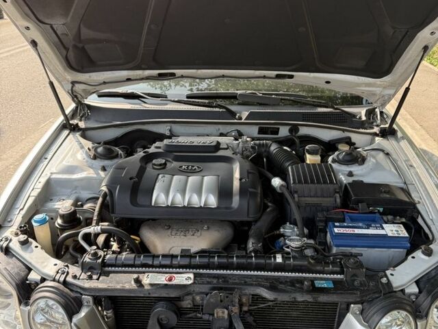 Серый Киа Маджентис, объемом двигателя 2 л и пробегом 199 тыс. км за 2999 $, фото 4 на Automoto.ua