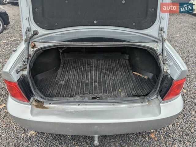 Сірий Кіа Маджентіс, об'ємом двигуна 2 л та пробігом 264 тис. км за 2850 $, фото 11 на Automoto.ua