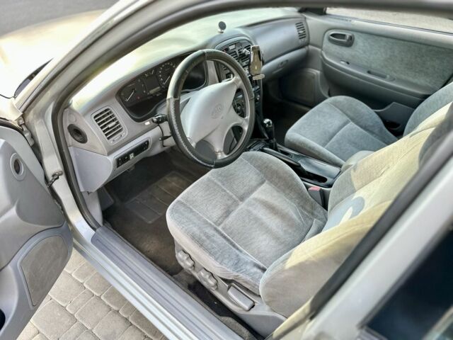 Серый Киа Маджентис, объемом двигателя 2 л и пробегом 280 тыс. км за 3500 $, фото 8 на Automoto.ua