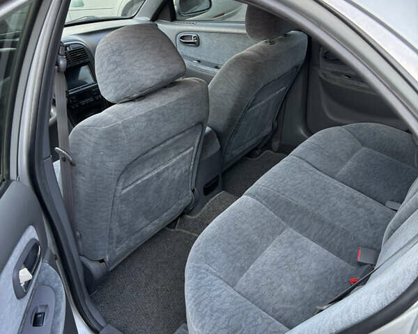 Серый Киа Маджентис, объемом двигателя 2 л и пробегом 175 тыс. км за 4500 $, фото 3 на Automoto.ua