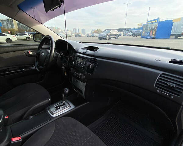 Серый Киа Маджентис, объемом двигателя 2 л и пробегом 303 тыс. км за 5500 $, фото 22 на Automoto.ua