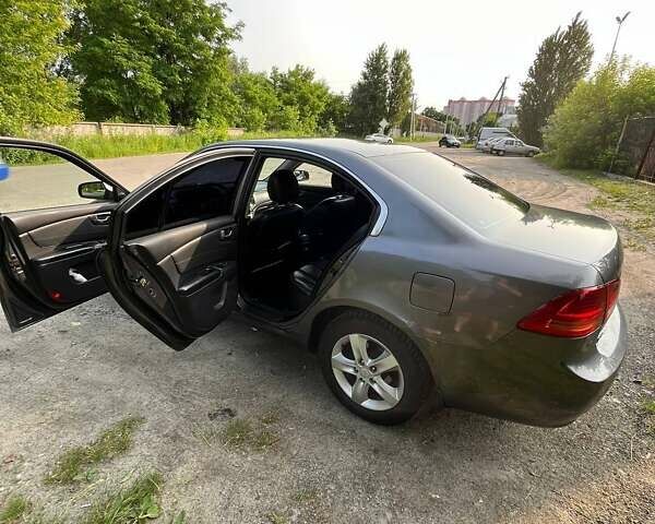 Серый Киа Маджентис, объемом двигателя 2 л и пробегом 249 тыс. км за 5300 $, фото 2 на Automoto.ua