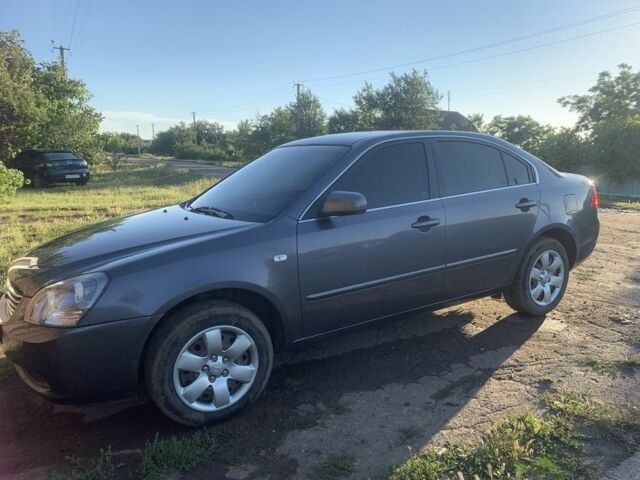 Серый Киа Маджентис, объемом двигателя 2 л и пробегом 250 тыс. км за 5800 $, фото 4 на Automoto.ua