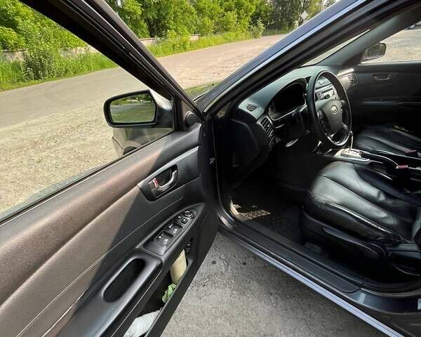Серый Киа Маджентис, объемом двигателя 2 л и пробегом 249 тыс. км за 5300 $, фото 3 на Automoto.ua
