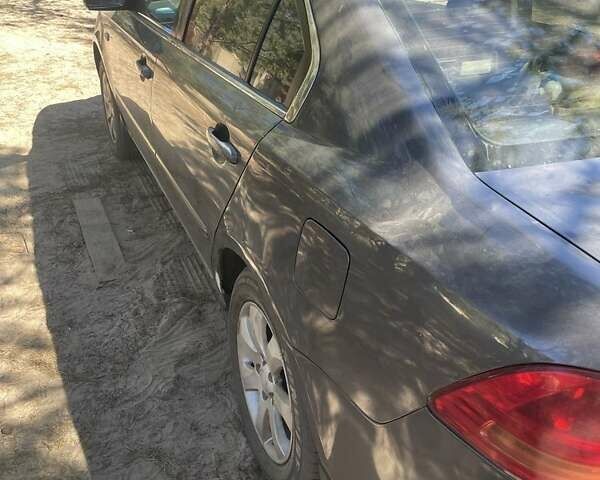 Серый Киа Маджентис, объемом двигателя 2 л и пробегом 180 тыс. км за 5300 $, фото 2 на Automoto.ua