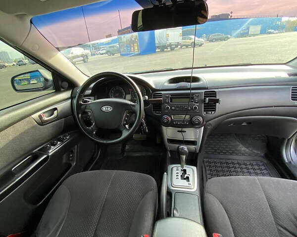 Серый Киа Маджентис, объемом двигателя 2 л и пробегом 303 тыс. км за 5500 $, фото 23 на Automoto.ua