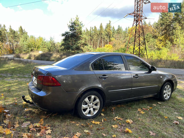 Серый Киа Маджентис, объемом двигателя 2 л и пробегом 200 тыс. км за 4895 $, фото 5 на Automoto.ua