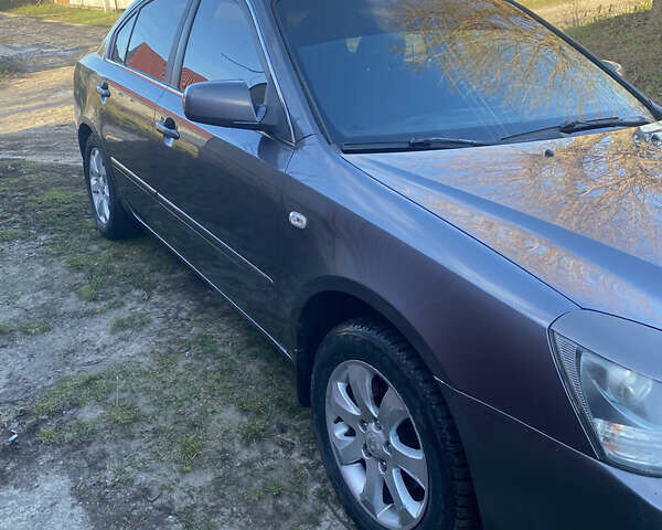 Сірий Кіа Маджентіс, об'ємом двигуна 2 л та пробігом 303 тис. км за 4700 $, фото 10 на Automoto.ua