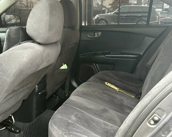 Серый Киа Маджентис, объемом двигателя 2 л и пробегом 280 тыс. км за 6000 $, фото 9 на Automoto.ua