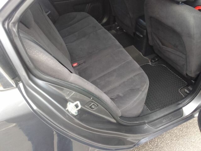 Серый Киа Маджентис, объемом двигателя 2 л и пробегом 290 тыс. км за 6999 $, фото 5 на Automoto.ua