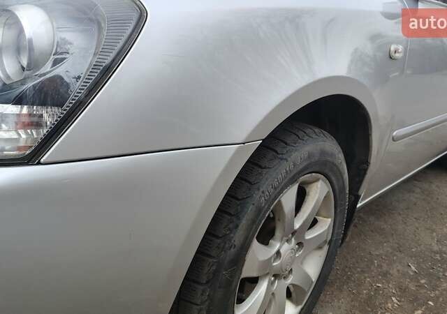 Сірий Кіа Маджентіс, об'ємом двигуна 2 л та пробігом 245 тис. км за 5700 $, фото 1 на Automoto.ua