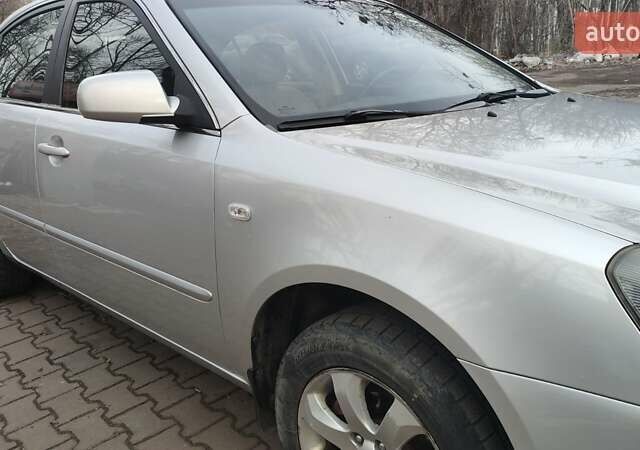 Сірий Кіа Маджентіс, об'ємом двигуна 2 л та пробігом 245 тис. км за 5700 $, фото 11 на Automoto.ua