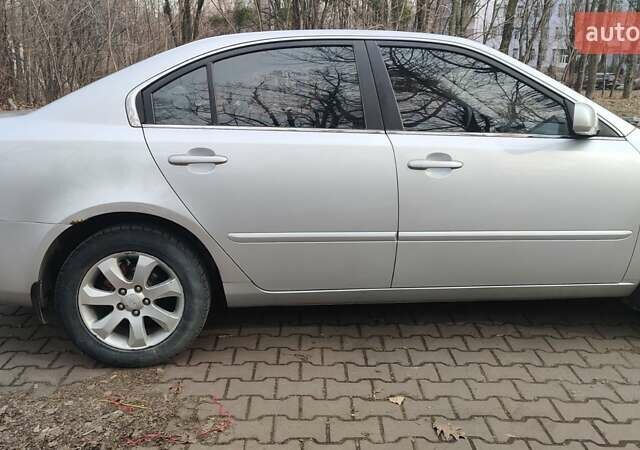 Сірий Кіа Маджентіс, об'ємом двигуна 2 л та пробігом 245 тис. км за 5700 $, фото 4 на Automoto.ua