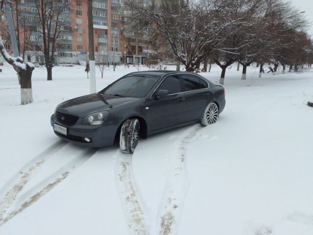 Серый Киа Маджентис, объемом двигателя 2 л и пробегом 290 тыс. км за 6999 $, фото 3 на Automoto.ua