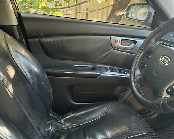 Серый Киа Маджентис, объемом двигателя 2 л и пробегом 310 тыс. км за 5400 $, фото 13 на Automoto.ua