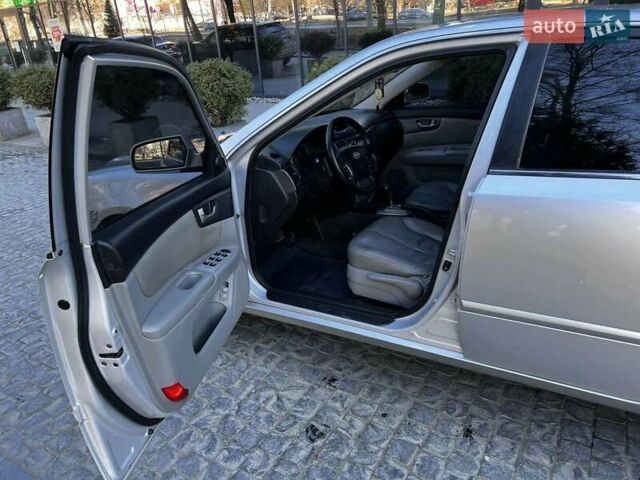 Сірий Кіа Маджентіс, об'ємом двигуна 2 л та пробігом 242 тис. км за 6200 $, фото 30 на Automoto.ua