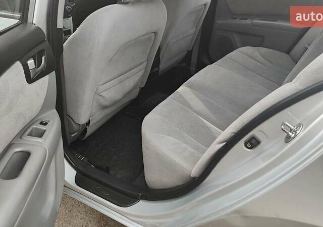 Сірий Кіа Маджентіс, об'ємом двигуна 2 л та пробігом 245 тис. км за 5700 $, фото 26 на Automoto.ua