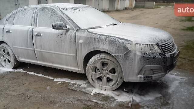 Сірий Кіа Маджентіс, об'ємом двигуна 2 л та пробігом 191 тис. км за 7700 $, фото 2 на Automoto.ua