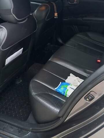 Сірий Кіа Маджентіс, об'ємом двигуна 2 л та пробігом 191 тис. км за 7700 $, фото 12 на Automoto.ua